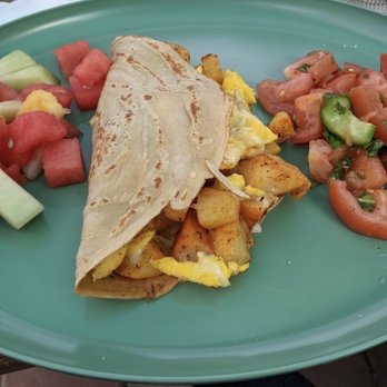 MAKE Cafe - Somali-style crepe stuffed with scrambled eggs, spiced potatoes, and melted jack cheese. And two sides. - Breakfast & Brunch Near Me - San Diego, California MAKE Cafe - Somali-style crepe stuffed with scrambled eggs, spiced potatoes, and melted jack cheese. And two sides. - Breakfast & Brunch Near Me - San Diego, California