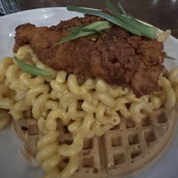 Chicken & Waffle Mac & Cheese (Cornbread waffle, Tennessee hot chicken breast, scallions).