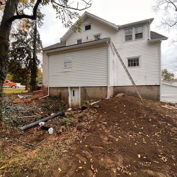 Skyroc Property Improvements - a house being built - Landscaping Near Me