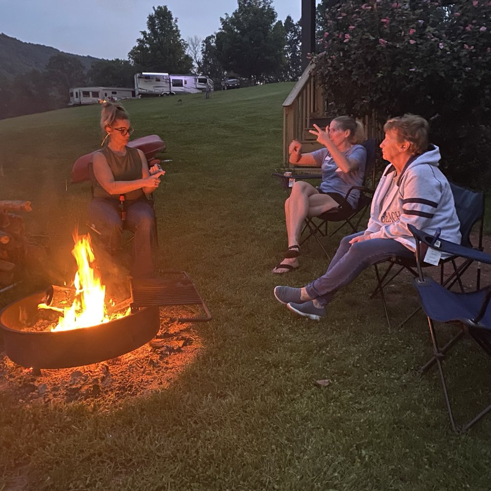 Lake Raystown Resort - Family campfire - Hotels Near Me - Entriken, Pennsylvania