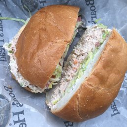 a chicken salad sandwich on a roll