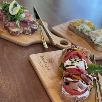Toastique - Tomato burrata toast, Italian toast, and avocado smash with crab. - Juice Bars & Smoothies Near Me - Rocklin, California Toastique - Tomato burrata toast, Italian toast, and avocado smash with crab. - Juice Bars & Smoothies Near Me - Rocklin, California