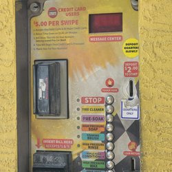Grand Prix Carwash - The self wash, clearly listed at 5 dollars.
