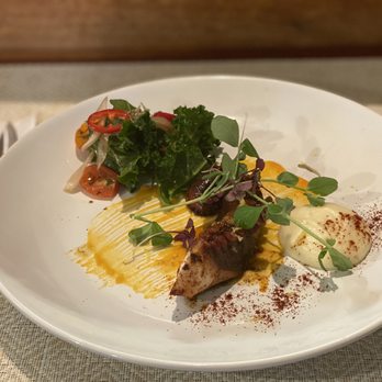 Miyo's Restaurant - Spanish octopus, souvide and then finished on the pain with butter. With parsnip purée and butternut squash purée. - Izakaya Near Me - Hilo, Hawaii