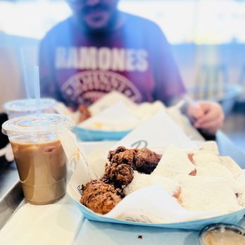 Beignet Spot - Inside dining area, chicory coffee and jerk chicken combo. - Coffee & Tea Near Me - Riverside, California Beignet Spot - Inside dining area, chicory coffee and jerk chicken combo. - Coffee & Tea Near Me - Riverside, California