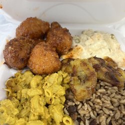 Delicious large plate to go!  Vegan cauliflower bites, Mac & cheese , rice & peas and vegan potato salad