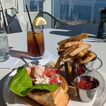 Pelham House Resort - Lobster roll, truffle fries and non alcoholic ice tea with ocean view - Hotels Near Me - Dennis Port, Massachusetts Pelham House Resort - Lobster roll, truffle fries and non alcoholic ice tea with ocean view - Hotels Near Me - Dennis Port, Massachusetts