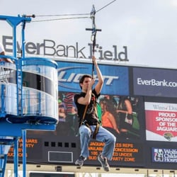 Zip Line
Climb up to the 28" platform, get fitted and zip on down the line.Presented at the Miami Dolphins stadium games...