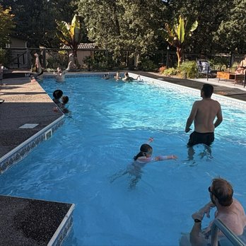 Phillips Pool Service - Family party with a pristine pool - Pool & Hot Tub Service Near Me Phillips Pool Service - Family party with a pristine pool - Pool & Hot Tub Service Near Me