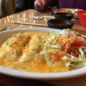 Magaly's Mexican Restaurant - So much cheesy goodness. Three chicken enchiladas with green chili sauce - Mexican Near Me - Benson, Arizona Magaly's Mexican Restaurant - So much cheesy goodness. Three chicken enchiladas with green chili sauce - Mexican Near Me - Benson, Arizona
