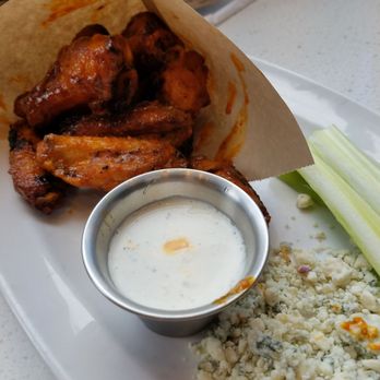 The Counter - Buffalo chicken wings served with ranch sauce, celery sticks and blue cheese - Burgers Near Me - Honolulu, Hawaii
