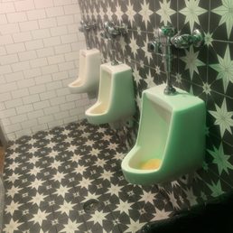 Gilligan's  restroom with no privacy! For such a nice place you would think they can do some updating