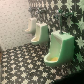 Gilligan's Island Bar & Grill - Gilligan's  restroom with no privacy! For such a nice place you would think they can do some updating - American Near Me - Siesta Key, Florida