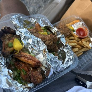Nashas Deep Fried Ribs - Unbeatable deal for a proper meal. Pictured here are the garlic parmigiana wings, fried ribs, seasoned fries, and bonus fried short rib - Southern Near Me - Los Angeles, California