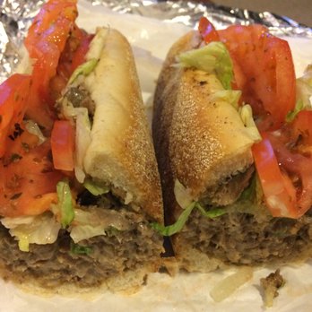 Roman Pantry - a meatball sandwich with tomatoes and lettuce - Pizza Near Me - Penns Grove, New Jersey Roman Pantry - a meatball sandwich with tomatoes and lettuce - Pizza Near Me - Penns Grove, New Jersey