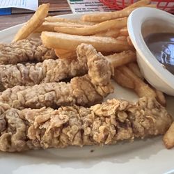 Hickory House - Steak Fingers and Fries with a side of brown gravy.
