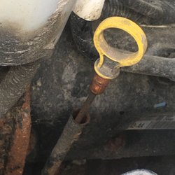 Auction Direct Auto Sales - Rusty dip stick, and mud, sand and dirt...corrosion...etc!