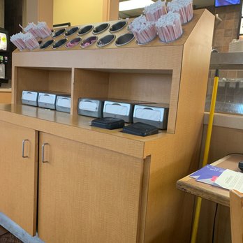 Bojangles - a counter with a lot of items on it - Chicken Wings Near Me - Wilmington, North Carolina Bojangles - a counter with a lot of items on it - Chicken Wings Near Me - Wilmington, North Carolina