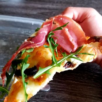 Sauce Pizza & Wine - A slice of Prosciutto & Fig pizza. - Italian Near Me - Mesa, Arizona Sauce Pizza & Wine - A slice of Prosciutto & Fig pizza. - Italian Near Me - Mesa, Arizona
