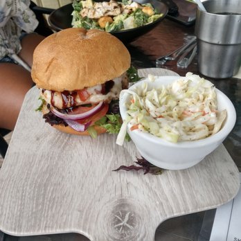 The Shack Riverfront - Bruschetta chicken sandwich with Cole slaw. - Seafood Near Me - Palm Bay, Florida The Shack Riverfront - Bruschetta chicken sandwich with Cole slaw. - Seafood Near Me - Palm Bay, Florida