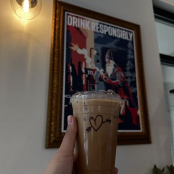 Myth & Legend - a hand holding a drink - Coffee & Tea Near Me - Johns Creek, Georgia Myth & Legend - a hand holding a drink - Coffee & Tea Near Me - Johns Creek, Georgia