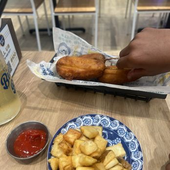 Biscuit Belly - Seaboard Station - 1 Pancake Corn Dog & Side of Home Fries - Breakfast & Brunch Near Me - Raleigh, North Carolina