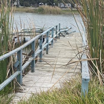 Bay View RV Resort - Dock for fishing. Can't be accessed due to overgrown weeds and grass, and it's falling apart. - Resorts Near Me - Rockport, Texas