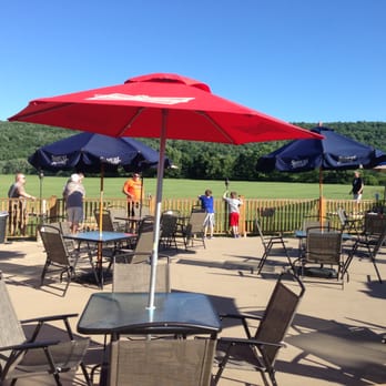 Lippy's Bar & Grill - tables and umbrellas - Sports Bars Near Me - Greene, New York Lippy's Bar & Grill - tables and umbrellas - Sports Bars Near Me - Greene, New York