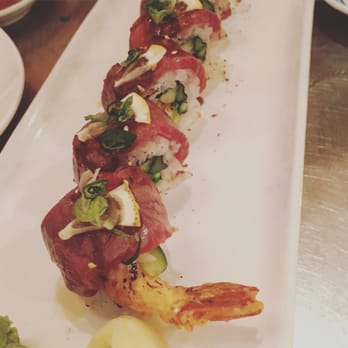 iSushi - "Surf and turf", torched Kobe beef on top of shrimp and asparagus roll, one of my faves here - Sushi Bars Near Me - Castro Valley, California iSushi - "Surf and turf", torched Kobe beef on top of shrimp and asparagus roll, one of my faves here - Sushi Bars Near Me - Castro Valley, California