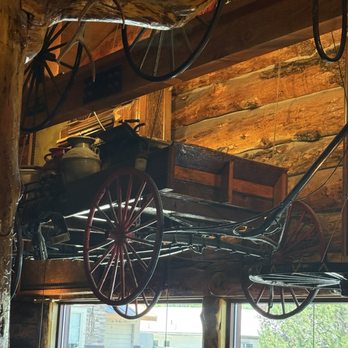 Red's Old 395 Grill - Cool carriage hanging from the wall - New American Near Me - Carson City, Nevada Red's Old 395 Grill - Cool carriage hanging from the wall - New American Near Me - Carson City, Nevada