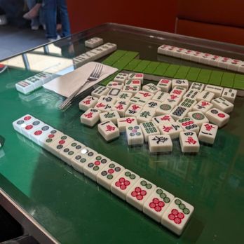 Bayao Cafe - We were seated in a table with a set of mahjong tiles. It was first time seeing one in a cafe. The table was cover with a glass cover. - Hong Kong Style Cafe Near Me - Quincy, Massachusetts