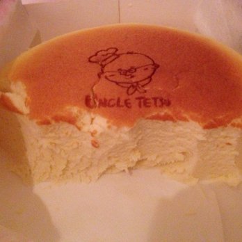 Uncle Tetsu's Japanese Cheesecake - Cutting through the cake - Desserts Near Me - Sydney, NSW