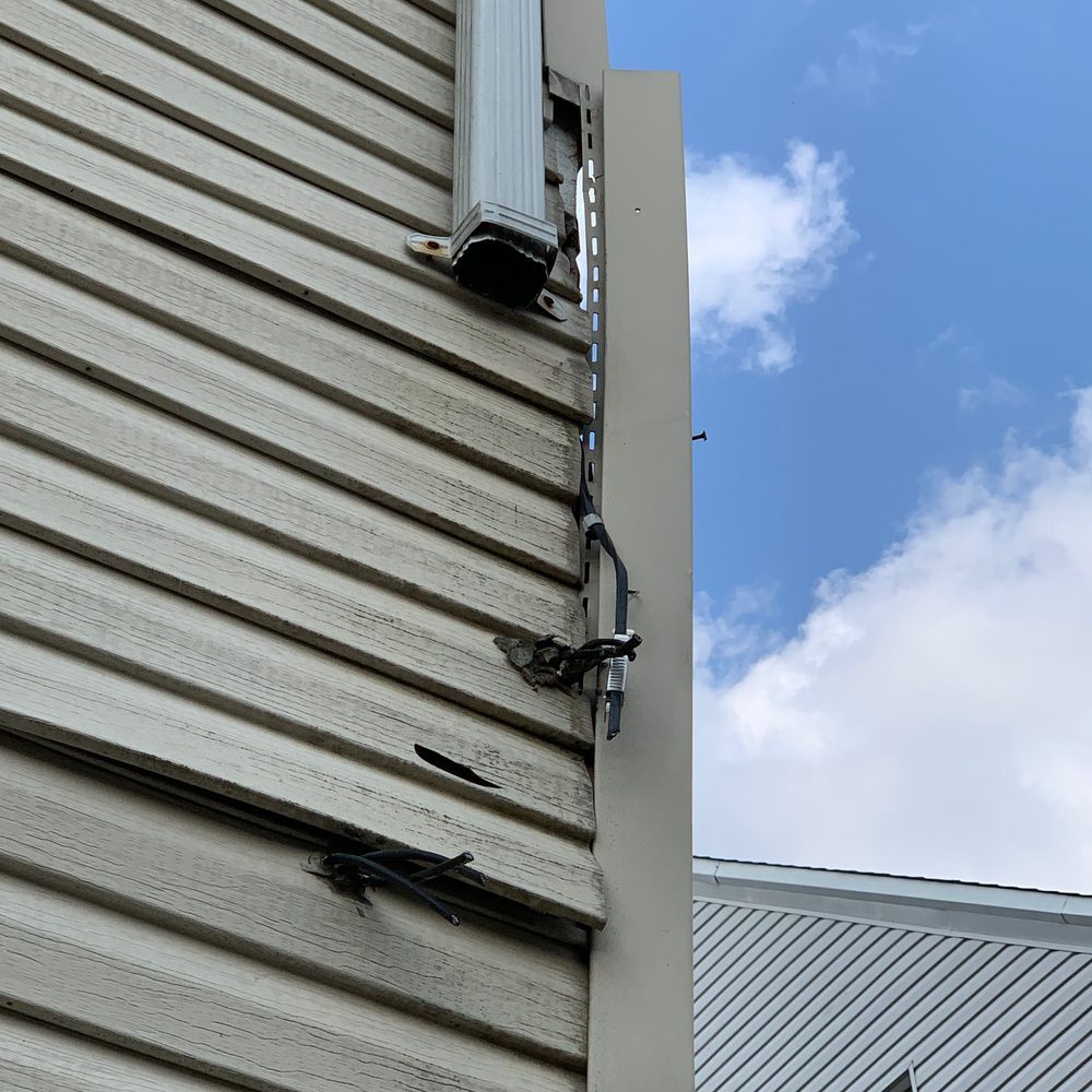 Our siding was damaged due to cables being carelessly yanked off when they were throwing tree branches down. Our siding was damaged due to cables being carelessly yanked off when they were throwing tree branches down.