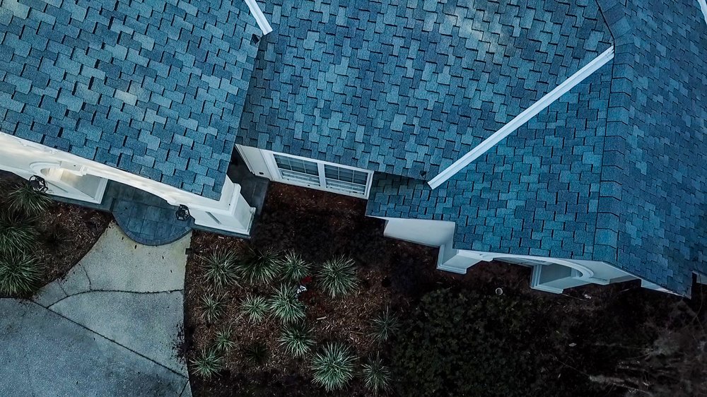 Slide of Action Roofing