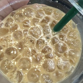 Starbucks - Iced Apple Crisp Macchiato with curdling milk aka spoiled milk - Coffee & Tea Near Me - Rosenberg, Texas