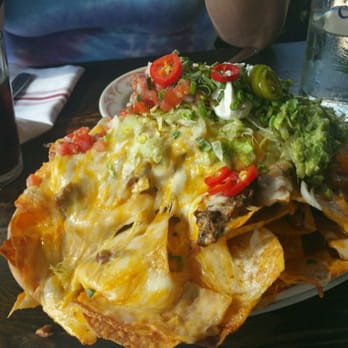 El Camino - Brisket nachos appetizer. - Cocktail Bars Near Me - Delray Beach, Florida El Camino - Brisket nachos appetizer. - Cocktail Bars Near Me - Delray Beach, Florida