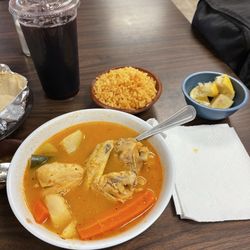 Taqueria Ixtlan - Caldo de pollo, arroz, Bahia de Jamaica, and corn tortillas. With green salsa and lemons.