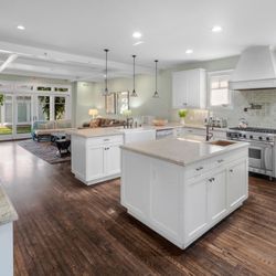 Clearview Treatment Programs - Bright white kitchen and dining area with large table and natural light, part of Clearview's residential mental health program.