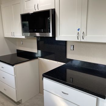 Amazonia Kitchen & Bath - Stove and pantry side. - Countertop Installation Near Me