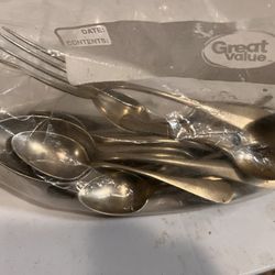 Gold Exchange - What does the "m" hallmark mean? Is this silverware valuable?