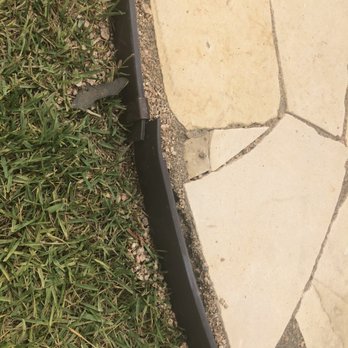 BDH Landscaping - a close up view of the edge of a walkway - Landscaping Near Me - Cypress, Texas BDH Landscaping - a close up view of the edge of a walkway - Landscaping Near Me - Cypress, Texas