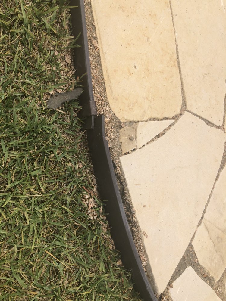 BDH Landscaping - a close up view of the edge of a walkway - Landscaping Near Me - Cypress, Texas BDH Landscaping - a close up view of the edge of a walkway - Landscaping Near Me - Cypress, Texas