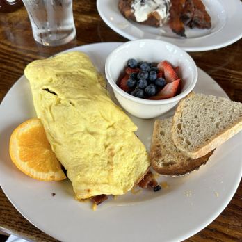Famous Toastery - Omelet with bacon and cheese and berries - Breakfast & Brunch Near Me - Winston-salem, North Carolina Famous Toastery - Omelet with bacon and cheese and berries - Breakfast & Brunch Near Me - Winston-salem, North Carolina