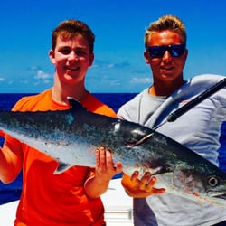 Southern Sportfishing - First Mate Austin (right) with a young man who caught his first King Mackerel.