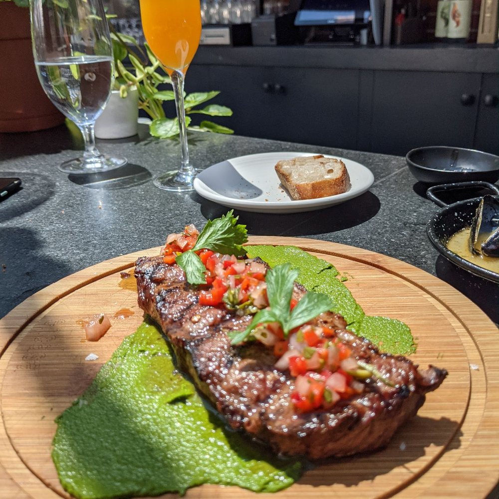 La Bodega - Short rib with chimichurry sauce - Spanish Near Me - Watertown, Massachusetts La Bodega - Short rib with chimichurry sauce - Spanish Near Me - Watertown, Massachusetts
