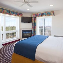 Holiday Inn Express & Suites Petoskey - Master bedroom with balcony