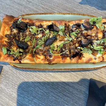 The Ridge Room - a plate of pizza and a glass of orange juice - Lounges Near Me - Harrisonburg, Virginia The Ridge Room - a plate of pizza and a glass of orange juice - Lounges Near Me - Harrisonburg, Virginia