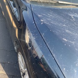 Ross Contractors - Ashes on hood of car.