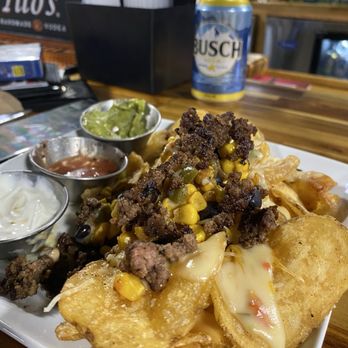 Southpaw Bar & Grill - The trashcan nachos are amazing! they're made with real potatoes. - Bars Near Me - Murphysboro, Illinois Southpaw Bar & Grill - The trashcan nachos are amazing! they're made with real potatoes. - Bars Near Me - Murphysboro, Illinois