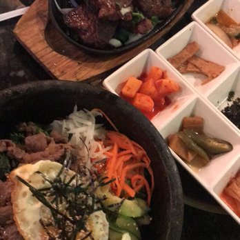 GOGI Korean BBQ - Bulgogi hot stone bibimbap with some short ribs in the background - Korean Near Me - Columbus, Ohio GOGI Korean BBQ - Bulgogi hot stone bibimbap with some short ribs in the background - Korean Near Me - Columbus, Ohio